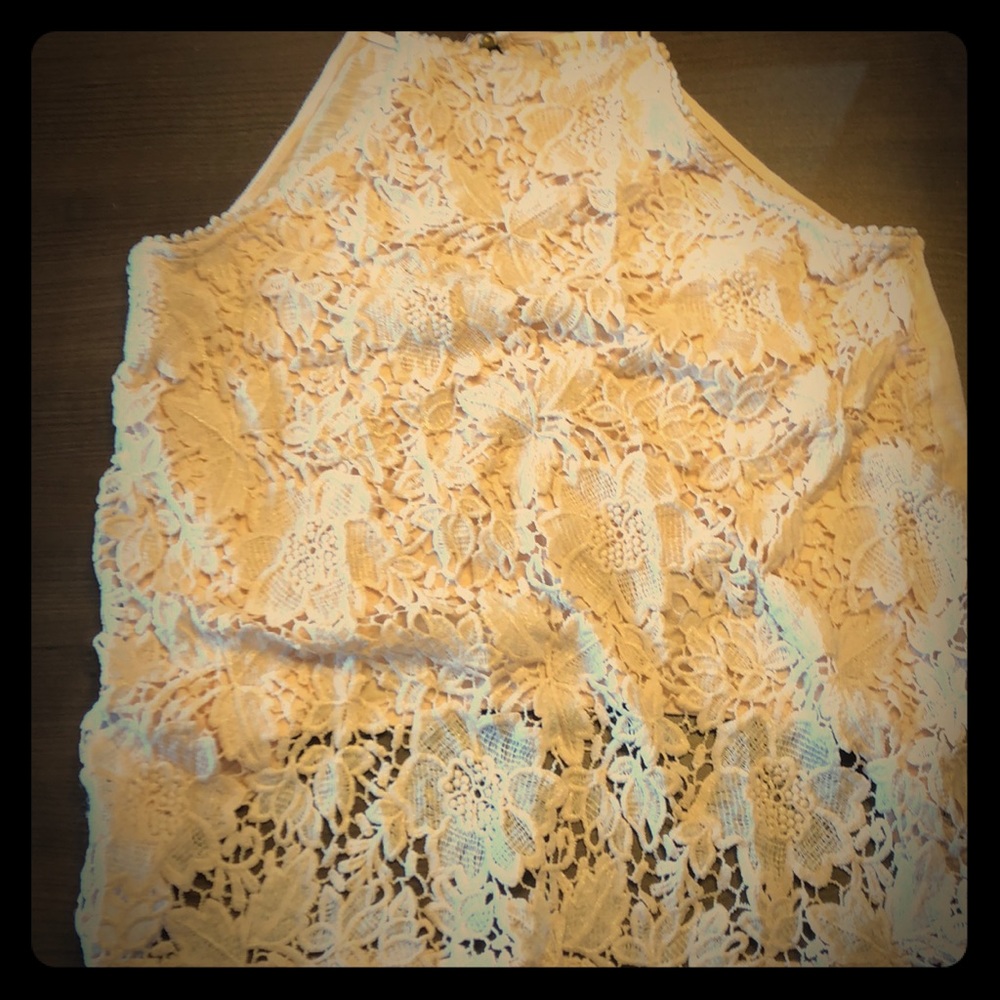L Altard state very light pink sleeveless shirt